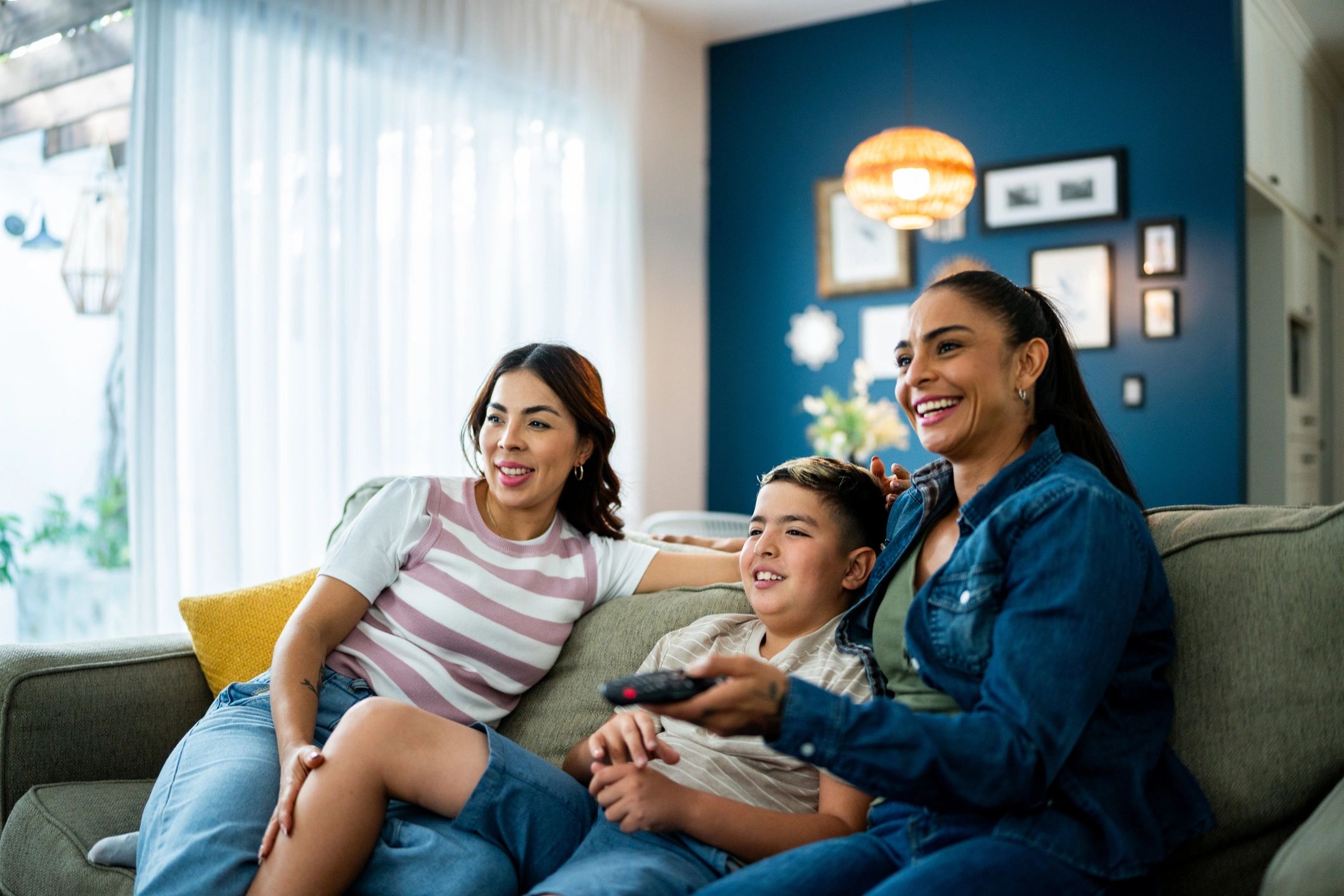 Family watching TV and streaming content at home
