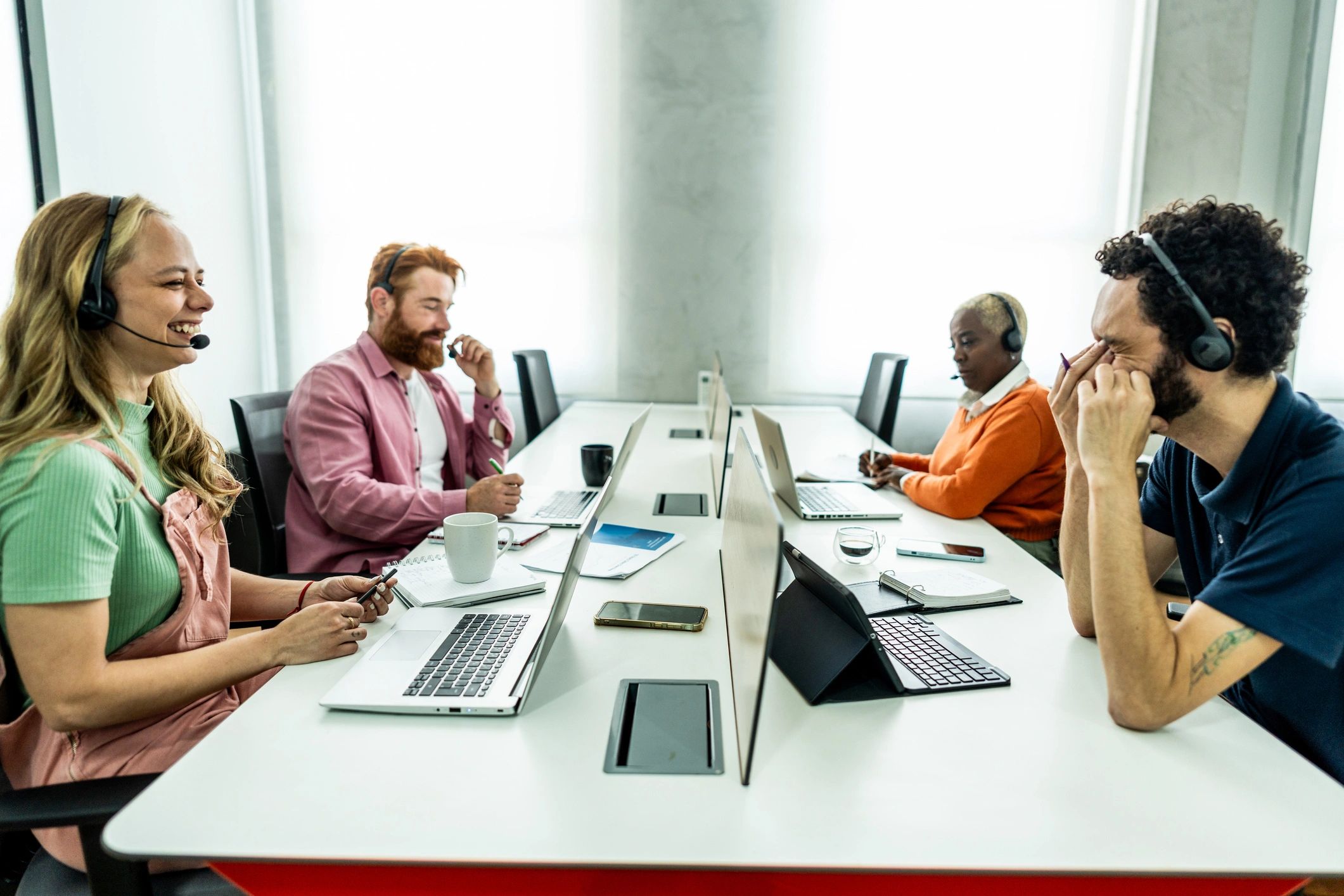 Coworkers discussing work in an office